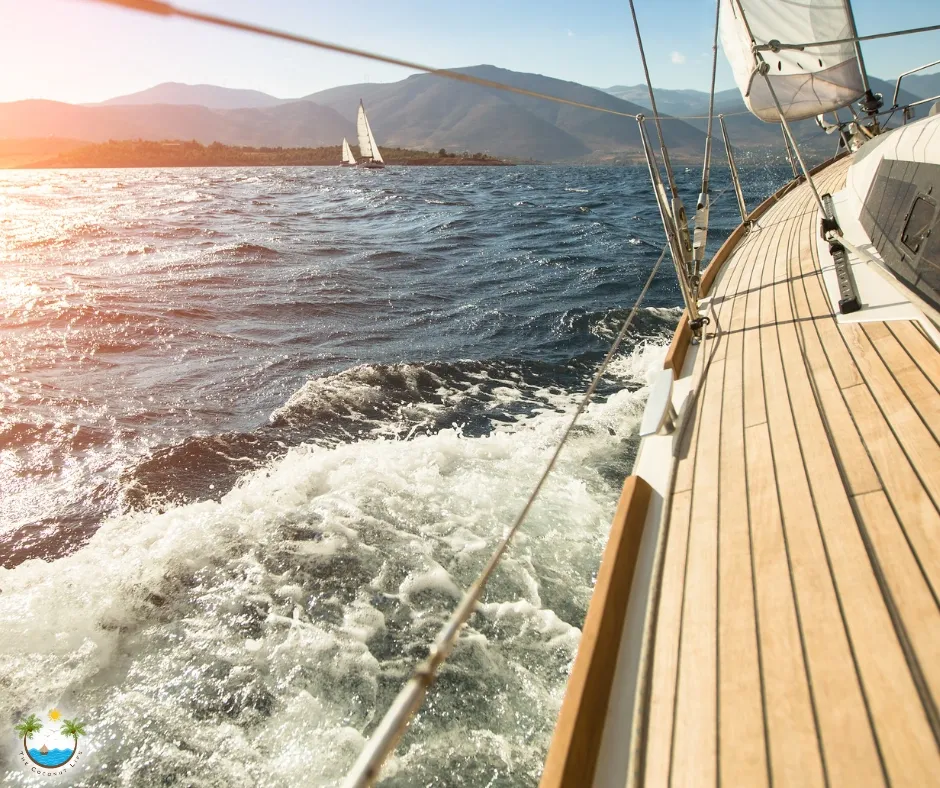 Gentle waves from the side of a sailboat.